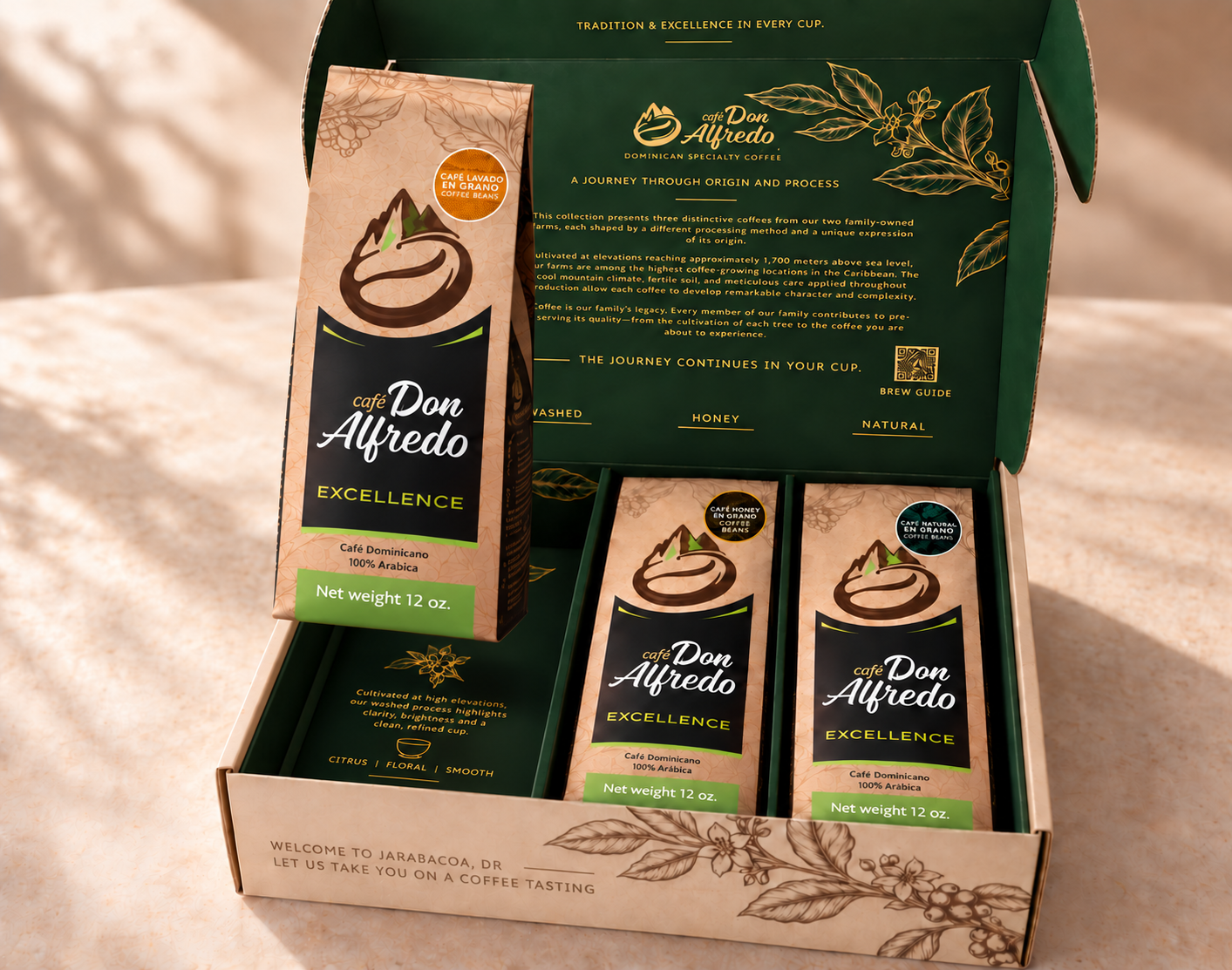 An open branded Don Alfredo coffee gift box containing three individually wrapped coffee bars, with the inner card and outer packaging visible on a sunlit neutral surface.